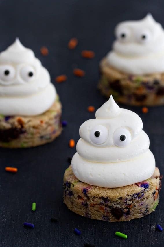 Halloween Chocolate Chip Cookies are spread with sweetly smooth buttercream. The sprinkles add the extra happy touch.