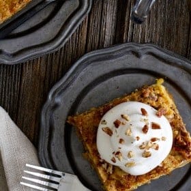 Pumpkin Crunch Cake is a classic fall dessert. Loaded with spices and topped with a dollop if whipped cream, it will quickly become your go-to dessert.