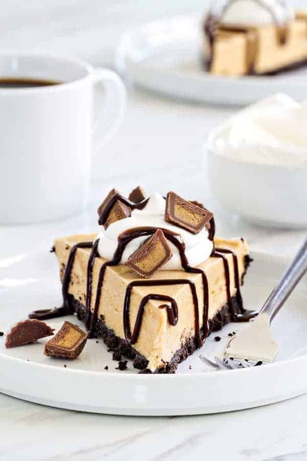 Peanut Butter Pie couldn't be easier or more delicious. Top it with mini peanut butter cups, whipped cream, and chocolate sauce for one seriously delicious dessert.