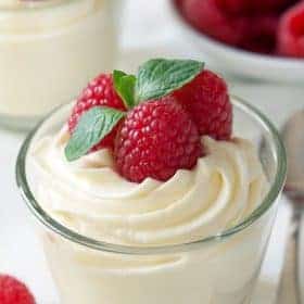 Easy white chocolate mousse made with cream cheese for an amazingly delicious treat that's perfect for Valentine's Day or a random Tuesday! Perfect for your sweetie!