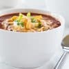 Slow Cooker Taco Soup uses up all your fresh and frozen veggies for a hearty, cozy dinner. Making it couldn't be easier!