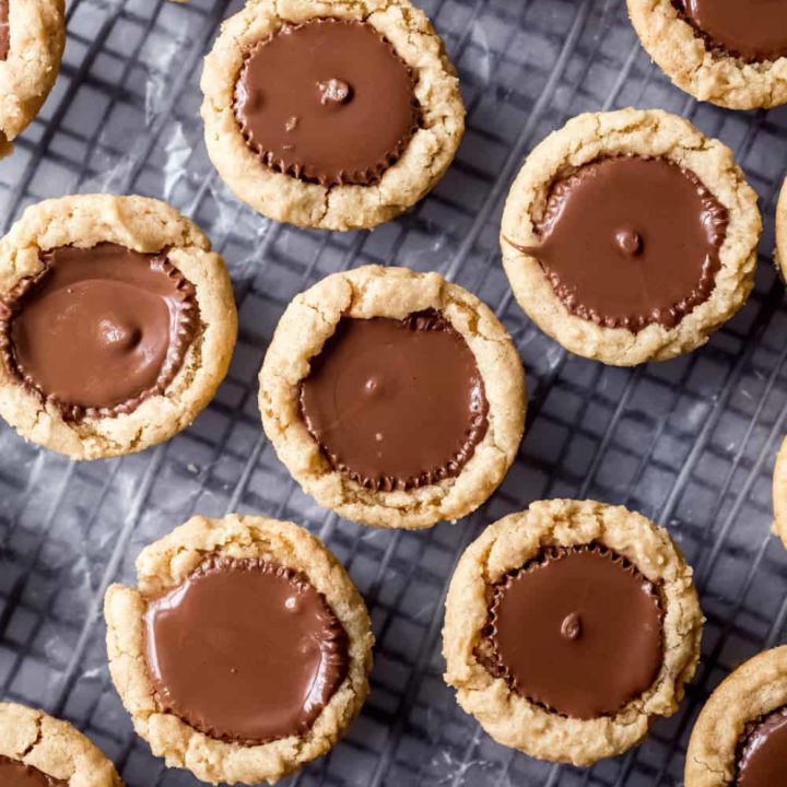Peanut butter cup cookies cooling on a cooling rack