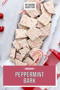 Overhead view of a white platter filled with pieces of peppermint bark. Text overlay includes recipe name.