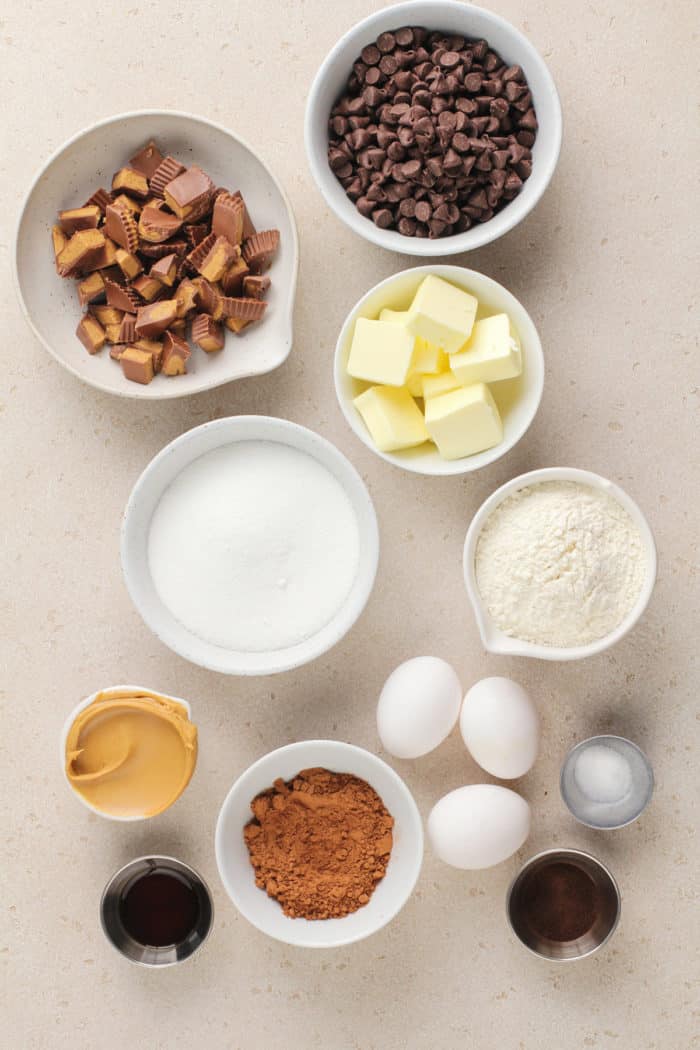 Ingredients for peanut butter cup brownies arranged on a countertop.
