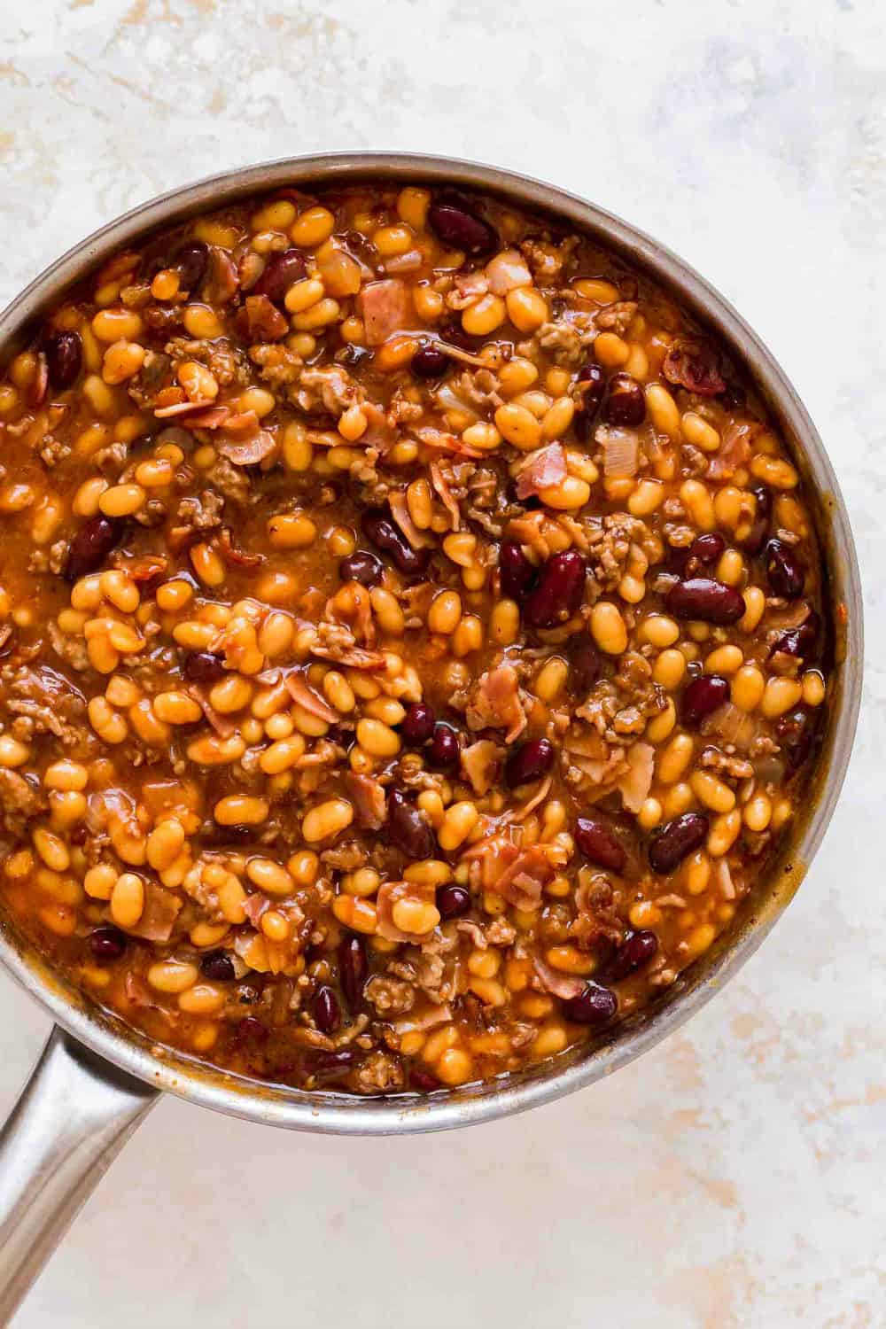 Old fashioned beans in a pan ready to be baked