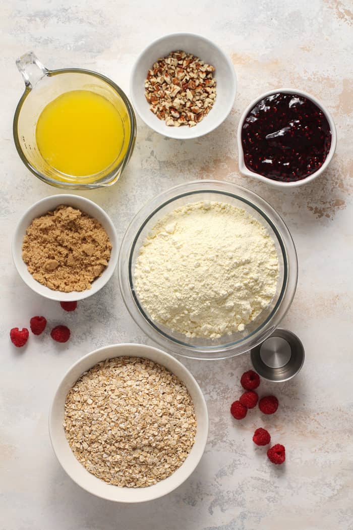 Ingredients for raspberry bars arranged on a countertop