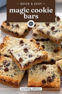 Magic bars cut into squares and arranged on a cutting board. Text overlay includes recipe name.
