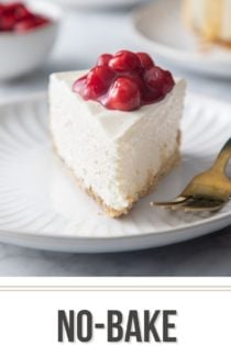 Front view of a slice of no-bake cheesecake topped with cherry pie filling on a white plate. text overlay includes recipe name.