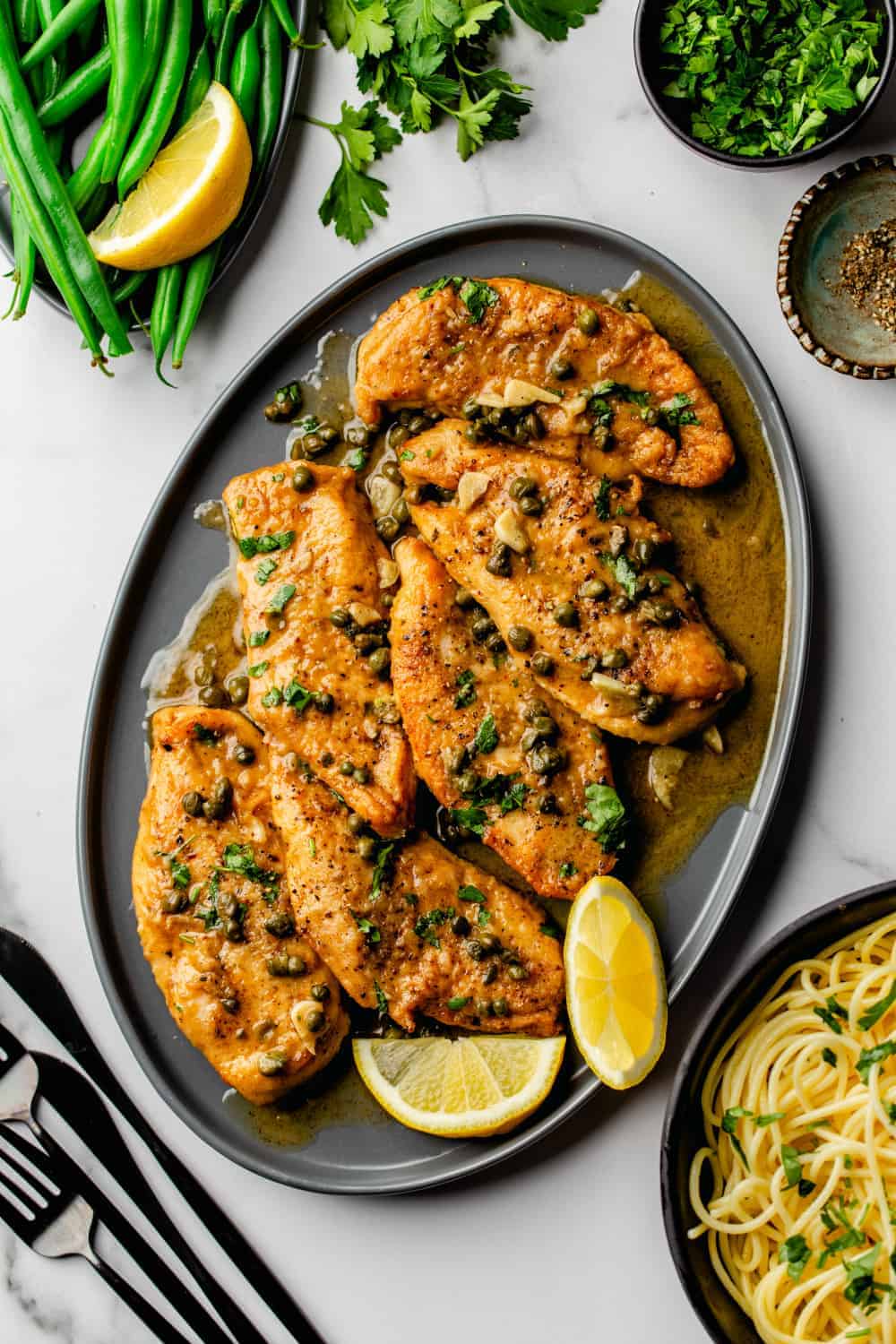 The bright flavor of lemon juice and the brininess of capers come together in the best way in this Chicken Piccata recipe. It is easy to make for a weeknight dinner but special enough to serve to company!