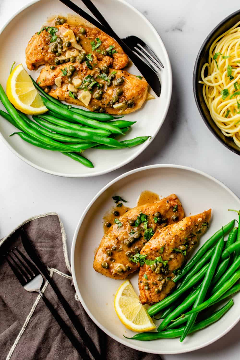 Serve Chicken Piccata with buttered pasta and a green vegetable for a complete, delicious meal.