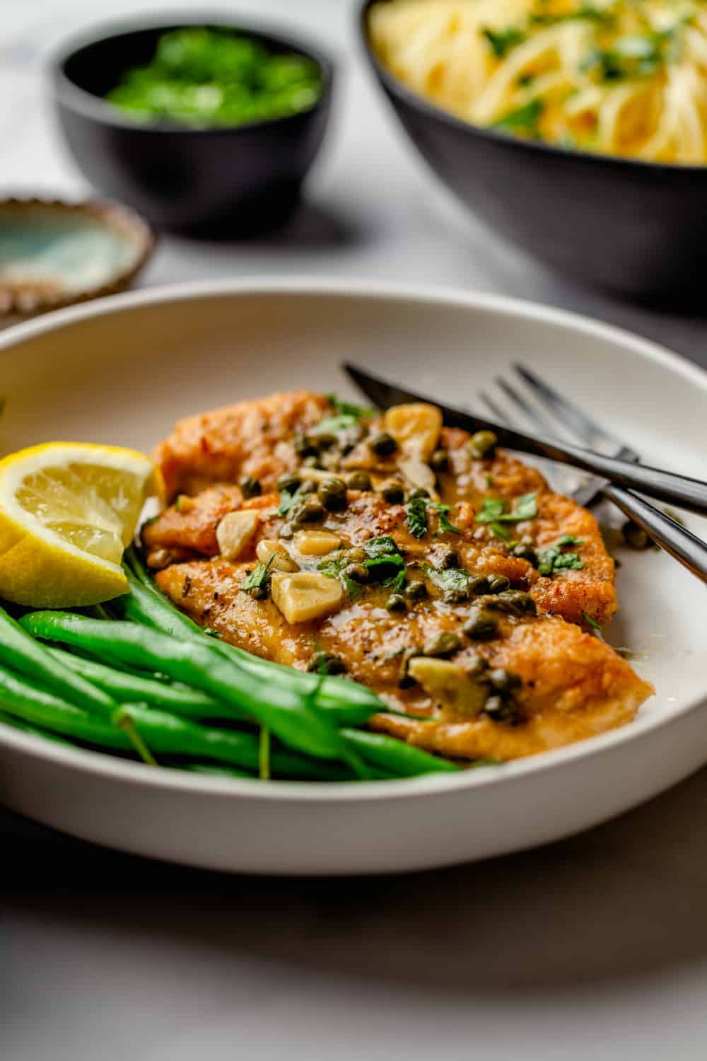 Lemon, garlic, capers and white wine make a delicious sauce for Chicken Piccata