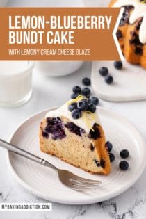 Slice of lemon-blueberry bundt cake topped with cream cheese glaze and whole blueberries set next to a fork on a white plate. Text overlay includes recipe image.