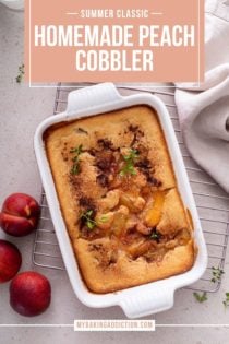 Overhead view of baked homemade peach cobbler on a wire rack. Text overlay includes recipe name.