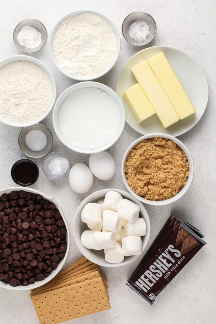 Ingredients for giant s'mores cookies arranged on a light-colored countertop.