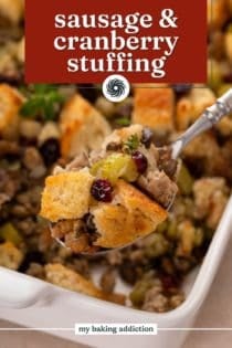 Spoonful of sausage and cranberry stuffing. Text overlay includes recipe name.