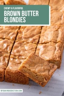 Sliced brown butter blondies on a piece of parchment paper. Text overlay includes recipe name.