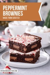 Two stacked peppermint brownies on a white plate, with cups of hot cocoa in the background. Text overlay includes recipe name.
