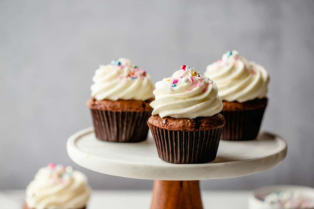 Homemade Buttercream Frosting is perfect for topping 24 cupcakes or a 9-inch layer cake