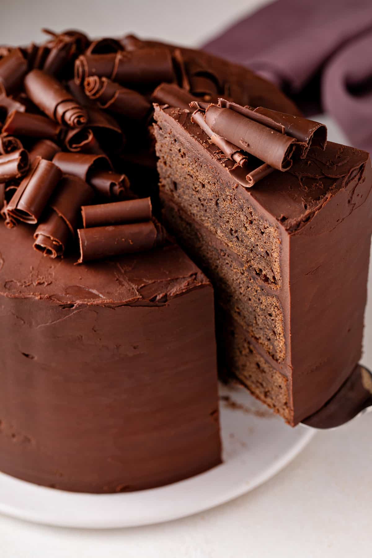 Slice being removed from a chocolate guinness cake.