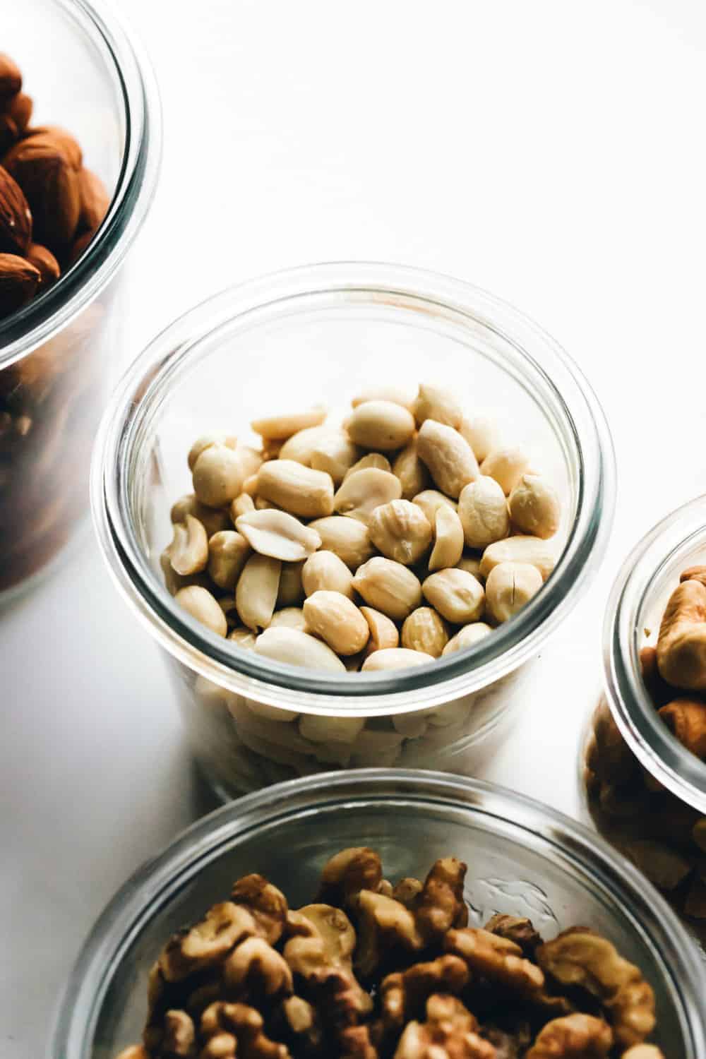 Toasted, skinned peanuts in a glass jar