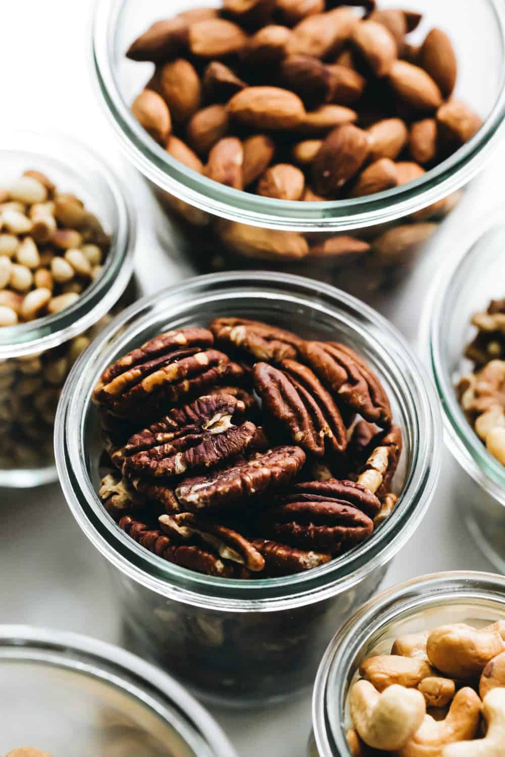 Toasted pecans in a glass jar