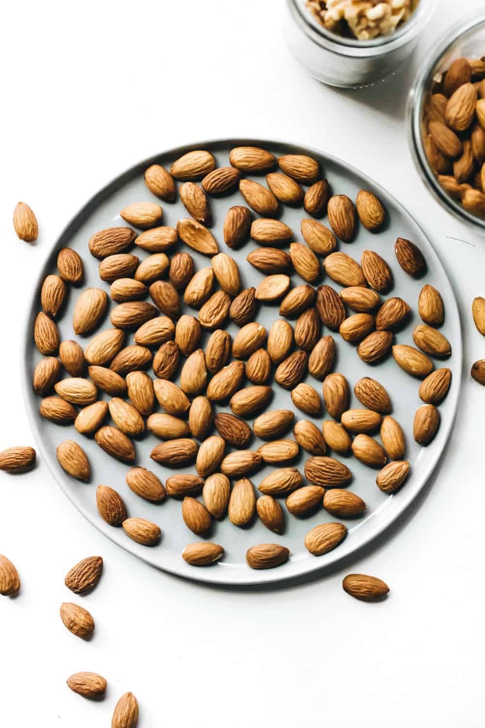 Whole almonds arranged on a plate