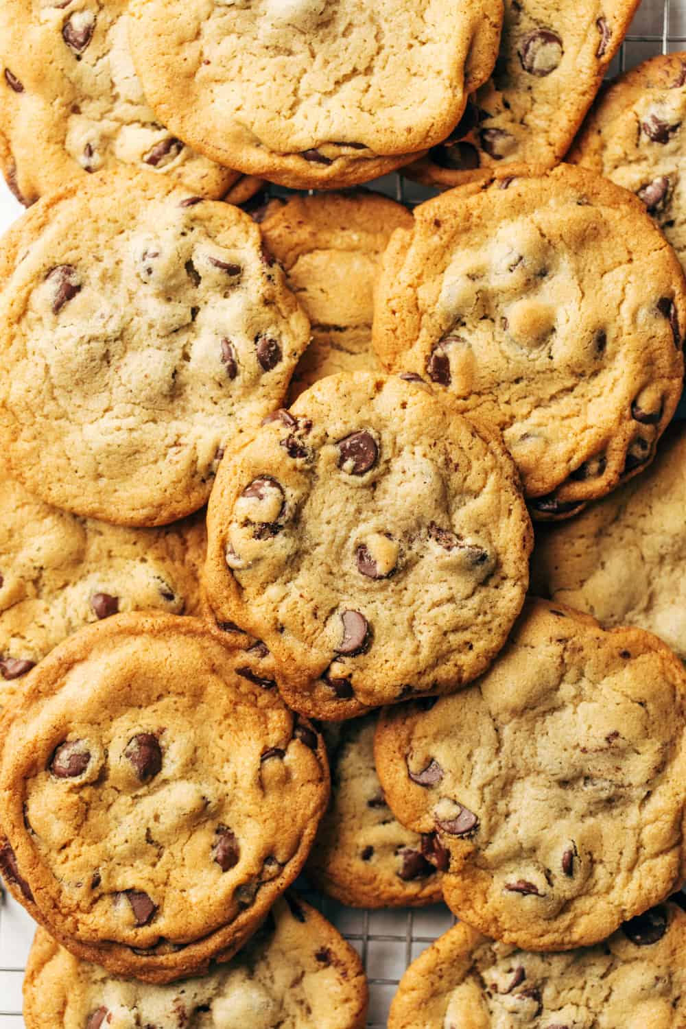 My favorite chocolate chip cookies are big, dense, chocolatey and chewy. This New York Times chocolate chip cookie recipe is truly the best – I am yet to try a better cookie!