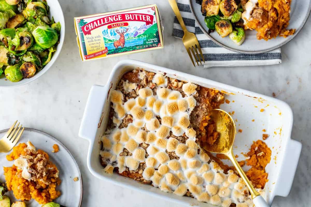 Dish of sweet potato casserole with streusel topping and marshmallows