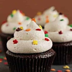 Pumpkin ale cupcakes with multicolored leaf shaped sprinkles
