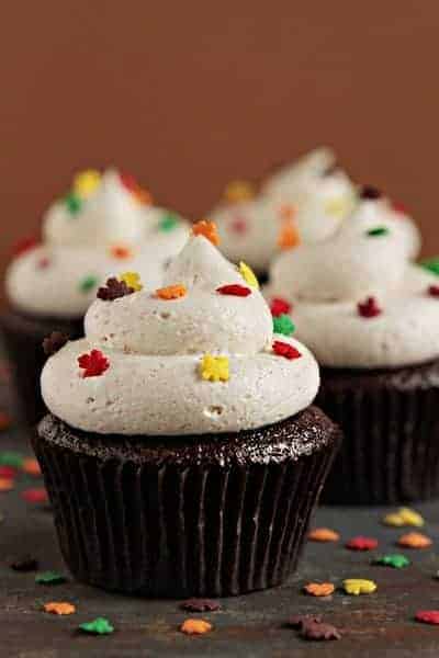 Pumpkin ale cupcakes with multicolored leaf shaped sprinkles