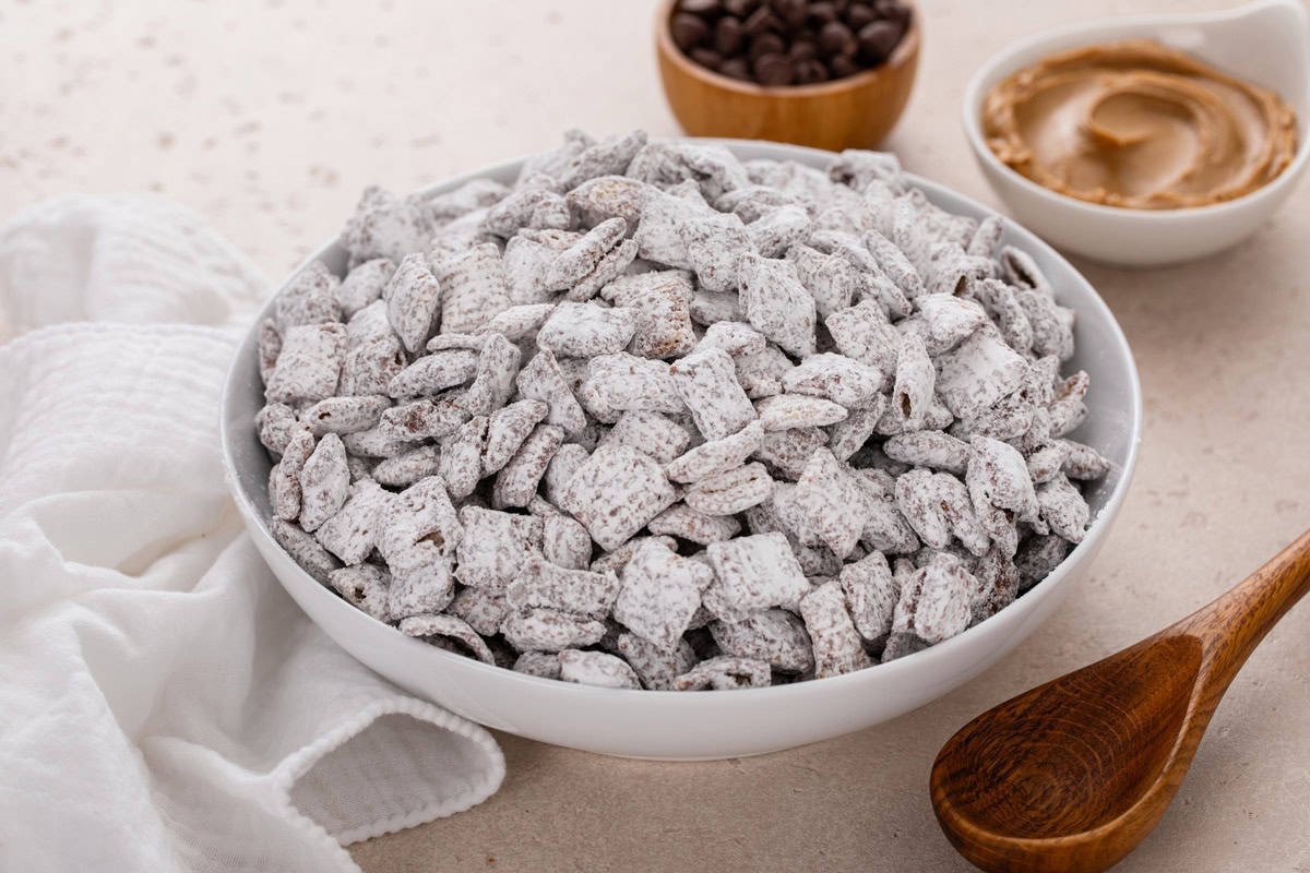 Large white bowl filled with puppy chow.