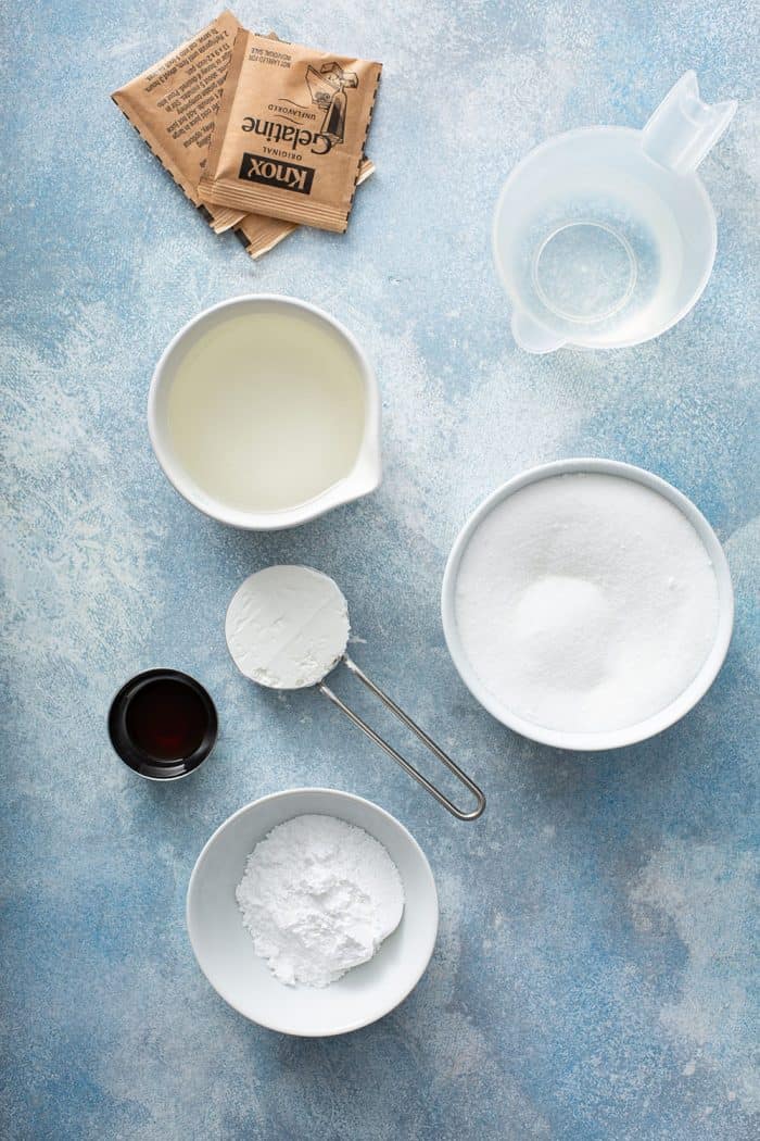 Ingredients for homemade marshmallows on a blue countertop