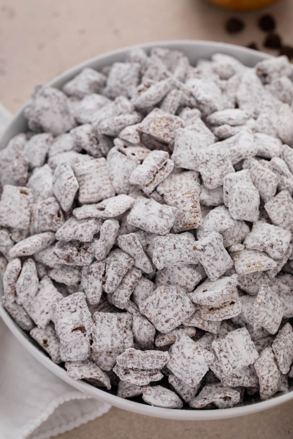 Close up of puppy chow in a large white bowl.