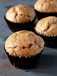 Chai muffins on a wood surface