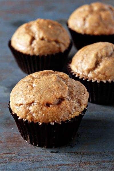 Chai muffins on a wood surface