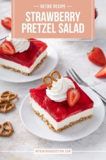 Two white plates, each with a slice of strawberry pretzel salad, set on a light-colored countertop. Text overlay includes recipe name.