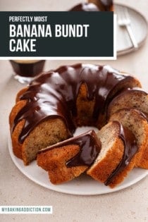 Sliced banana bundt cake topped with chocolate ganache on a white cake plate. Text overlay includes recipe name.