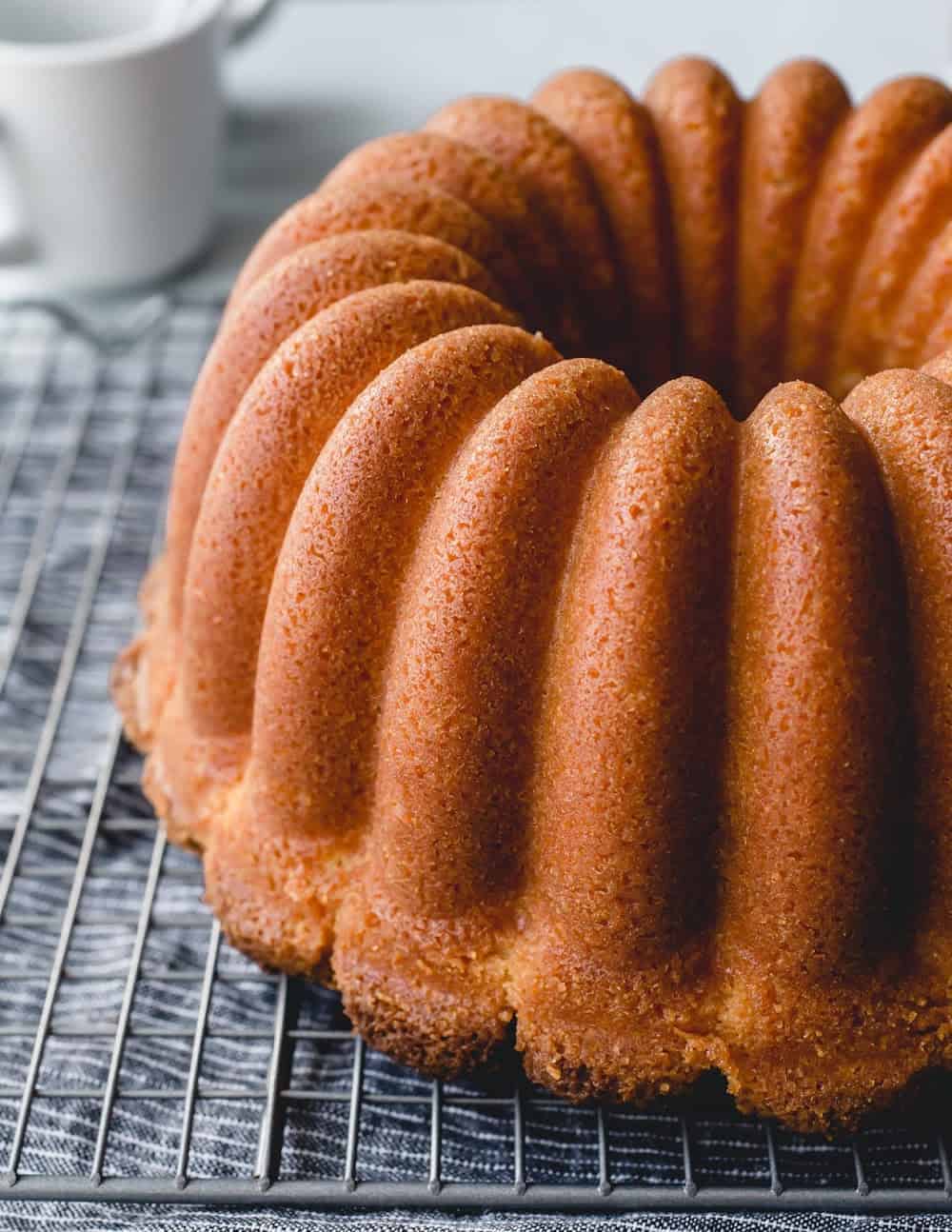 Freshly baked 7up pound cake cooling on a wire rack