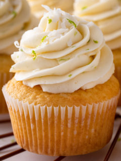 Close up of frosted coconut cupcake.