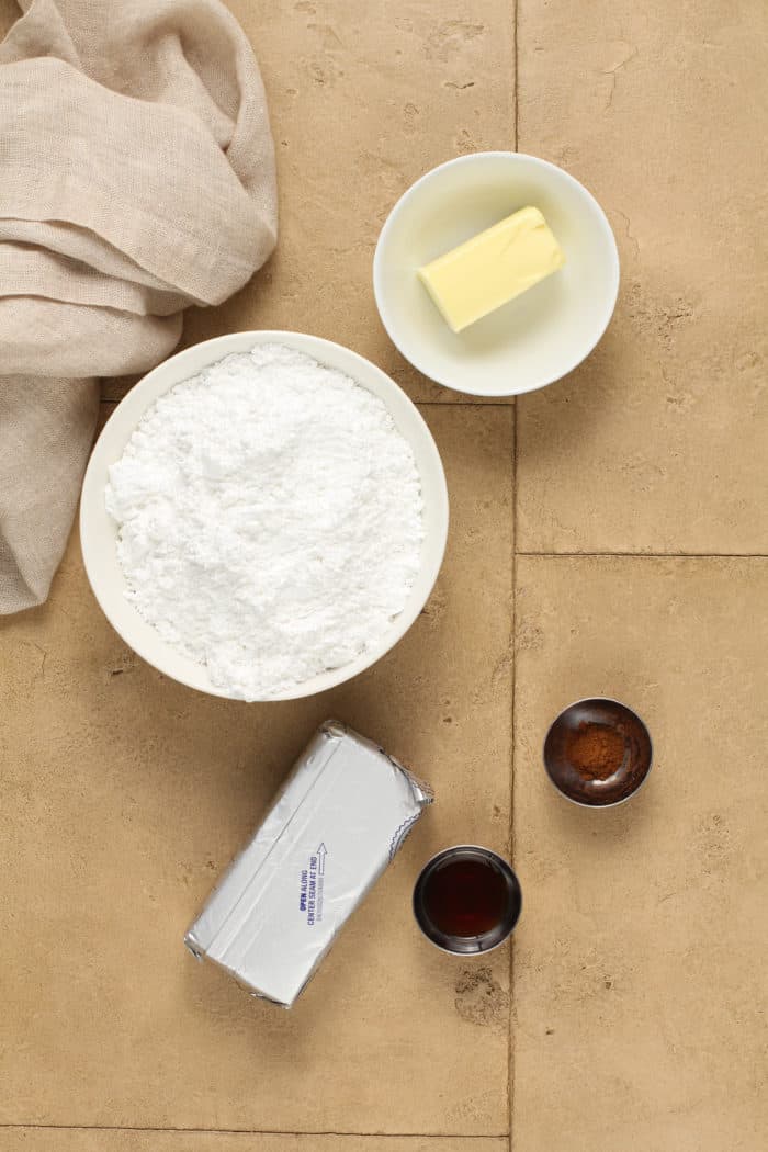 Cream cheese frosting ingredients on a countertop