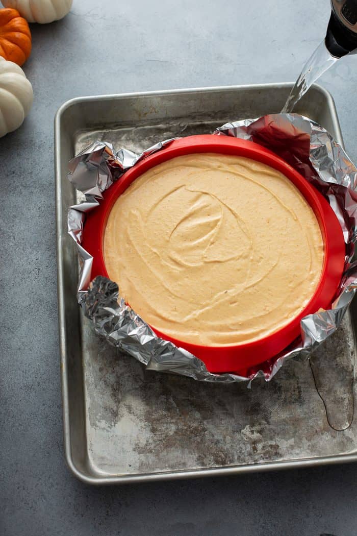 Pumpkin Cheesecake about to be baked in a water bath
