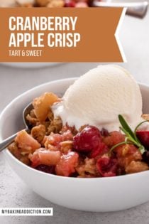 Cranberry apple crisp topped with a scoop of vanilla ice cream in a white bowl. Text overlay includes recipe name.