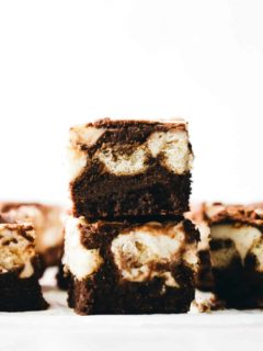 Side view of sliced and stacked tiramisu brownies