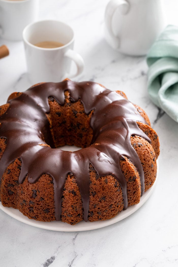 Chocolate chip bundt cake topped with chocolate ganache glaze.