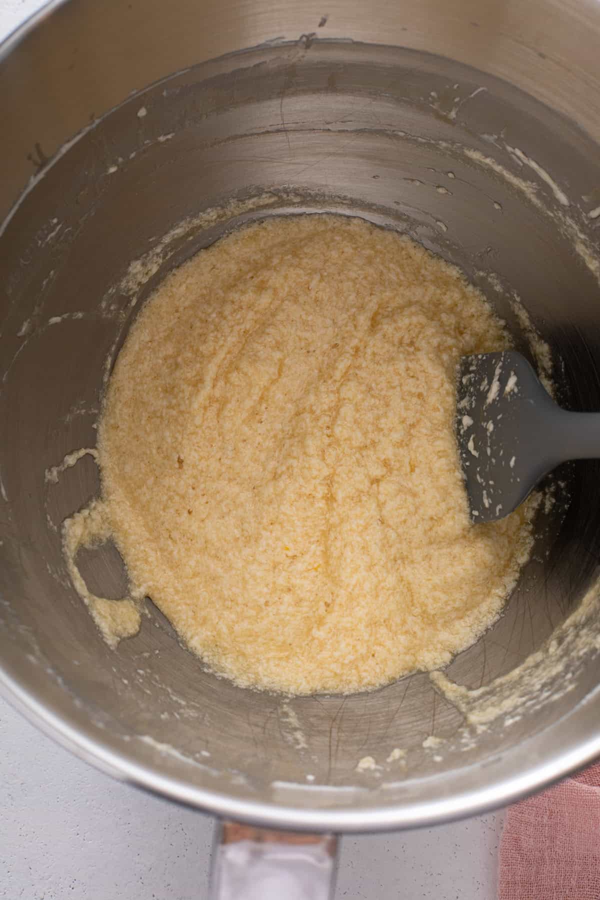 Wet ingredients for strawberry rhubarb cake mixed in a bowl.