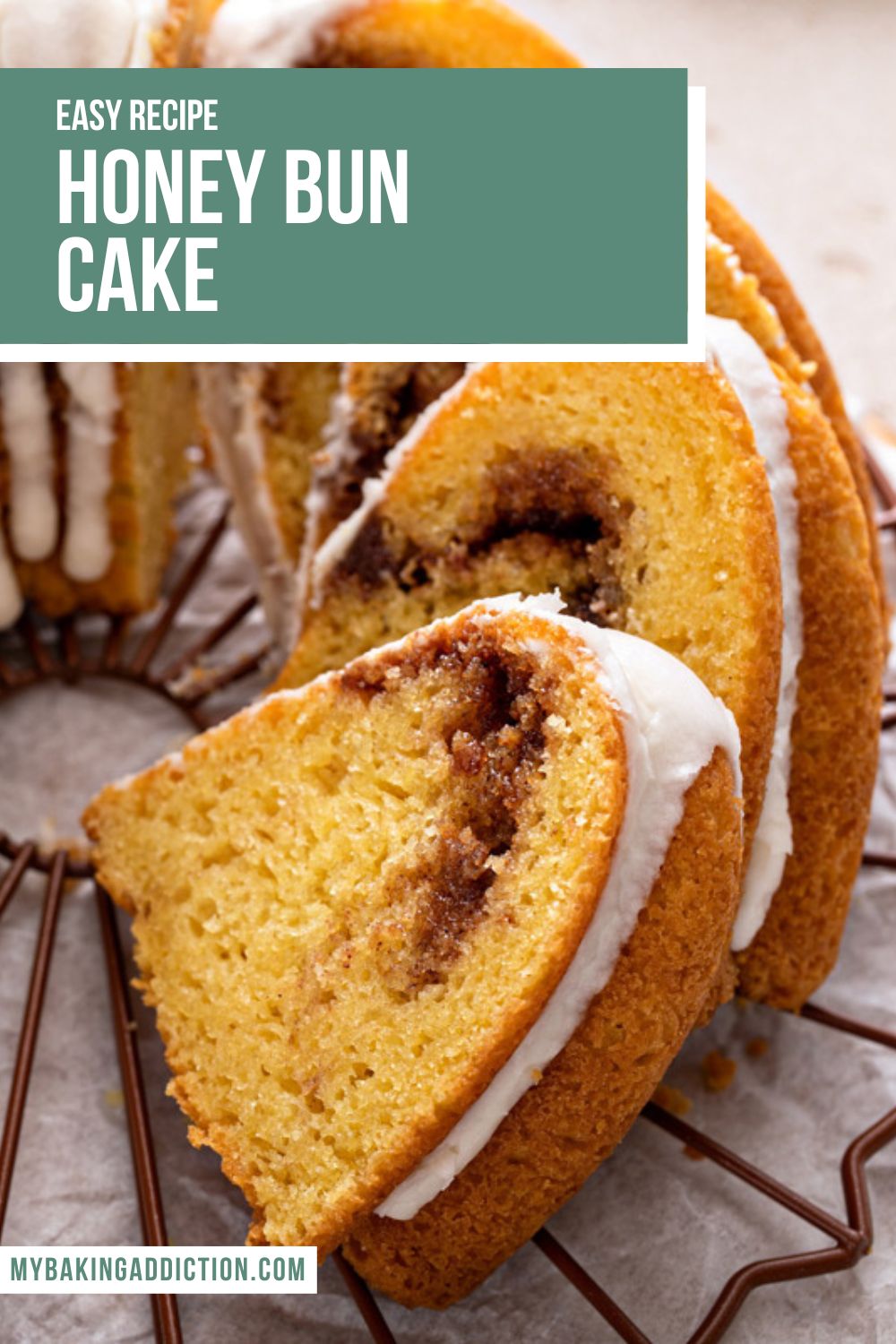 Sliced honey bun cake on a round wire rack set over a piece of parchment paper. Text overlay includes recipe name.