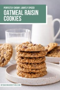 Six oatmeal raisin cookies stacked on a white plate in front of a glass of milk. Text overlay includes recipe name.