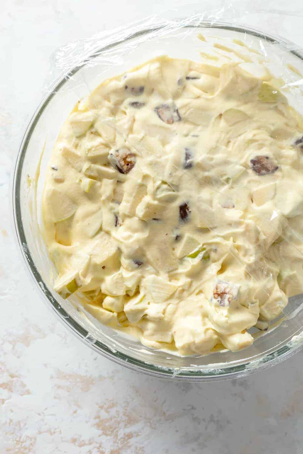 Snickers Caramel Apple Salad in a glass serving bowl