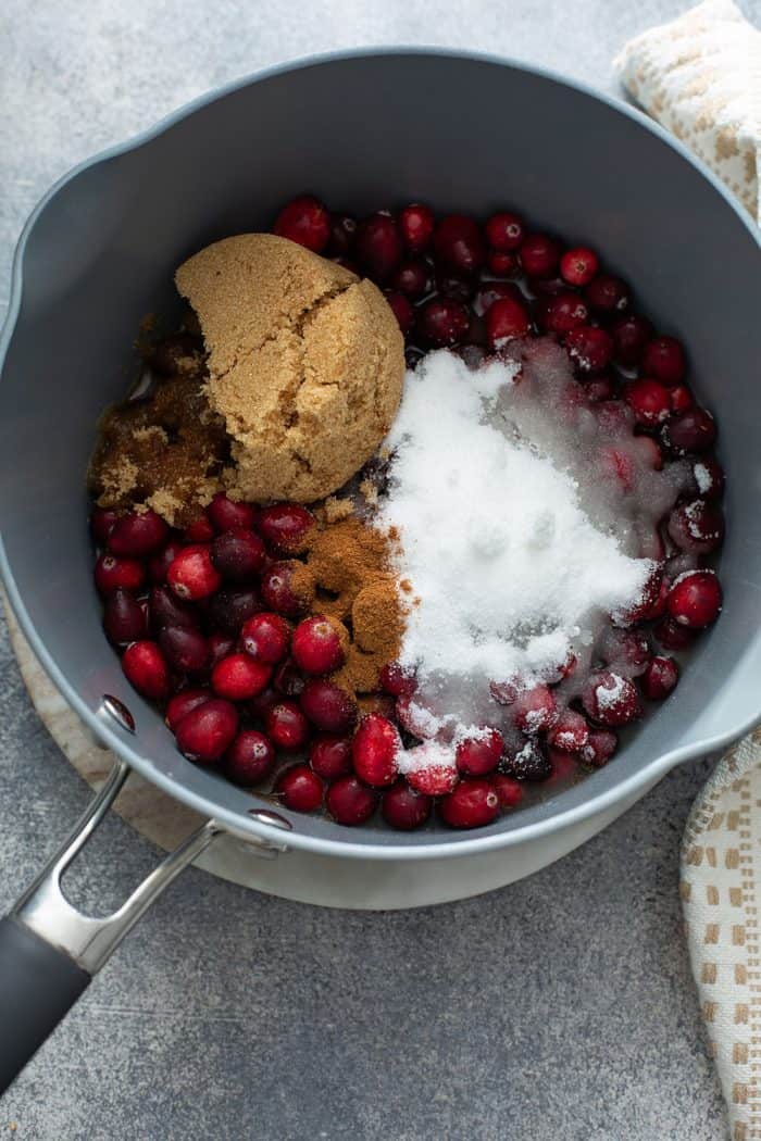 Cranberry sauce ingredients in a saucepan