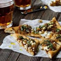 Homemade Pizza with Sausage, Caramelized Onions and Goat Cheese